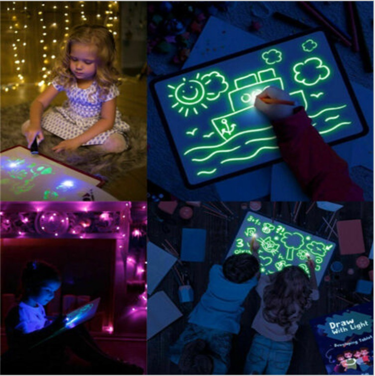 Kid with glow drawing pad